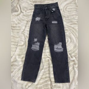 never worn ripped “light washed” black jeans